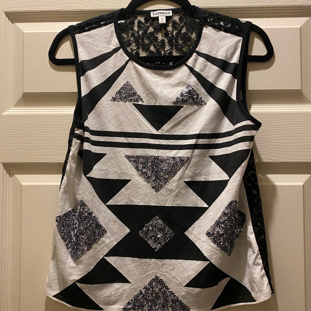 Express woman’s sequin shirt. Size medium